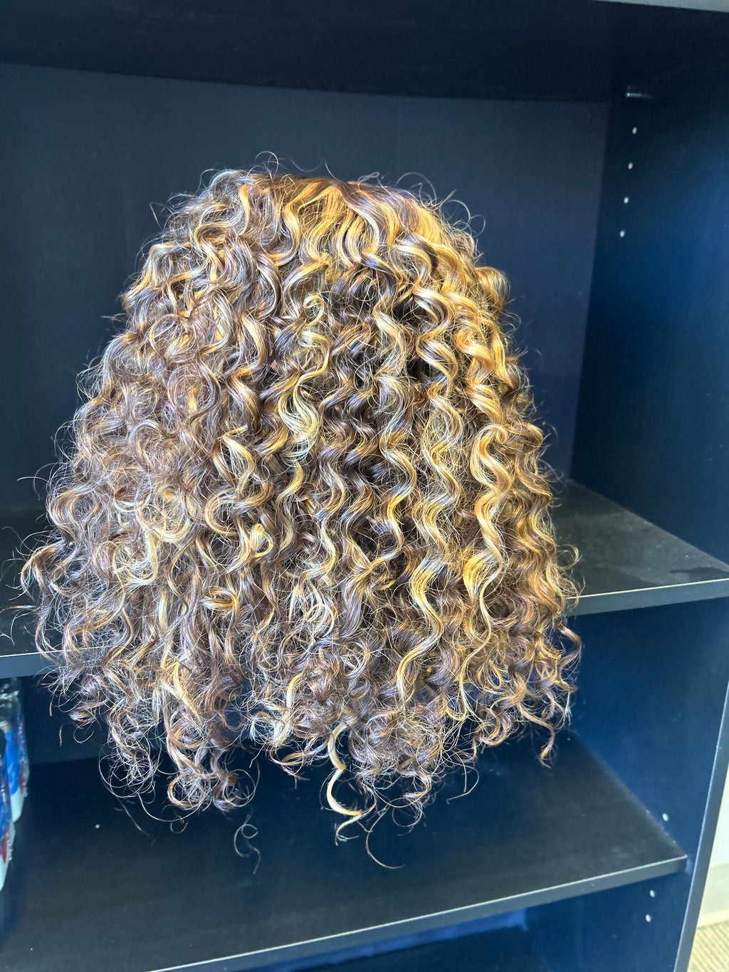 Synthetic Curly Wig – Highlighted Brown – 22 Inch